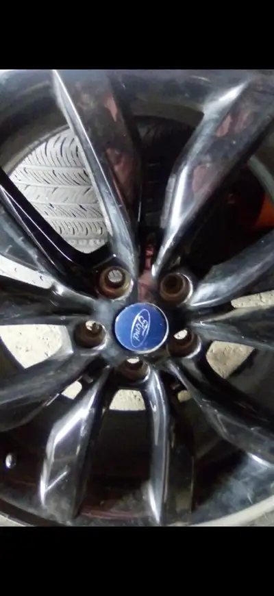 Set of 4 summer tires on black rims Size: 235/45R19 Like new condition with lots of tread left. $450...