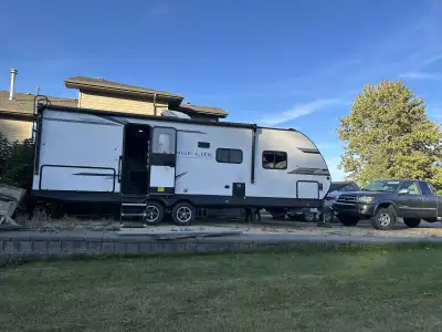 Selling are highland ridge open range 241 bunk house model. Very spacious trailer with a super slide...