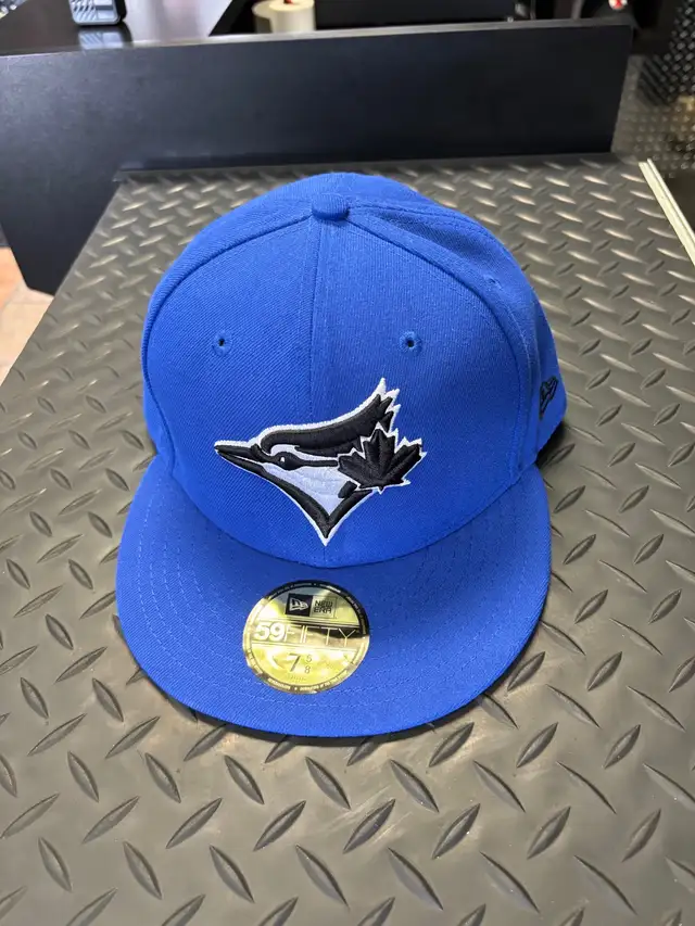 Toronto blue jays black crest size 7/5/863804702634371120