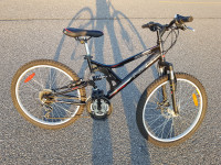 Mountain bicycle 24 in , dual suspension, disc brake