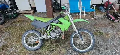 LOCATED IN HAINES JUNCTION Kawasaki 100cc two stroke Was rebuilt by a previous owner, starts easy Sh...