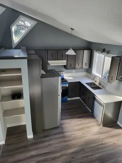 This charming townhouse in St. Albert offers a comfortable living space. Newly renovated ,wood burni...