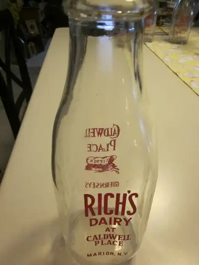 I have 6 of these older milk bottles All the same Rich's Dairy, Caldwell Place, Guernsey They are a...