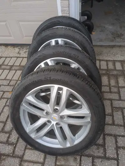 I am selling a set of 5x115 aluminum wheels wrapped in 235/50r19 tires. These are takeoffs from a Ch...