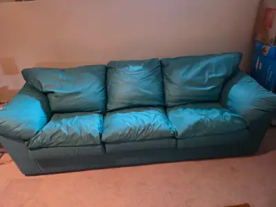 Teal green cloth couch. Good used condition. Sitting in basement unused last 10 years. Cash only - n...