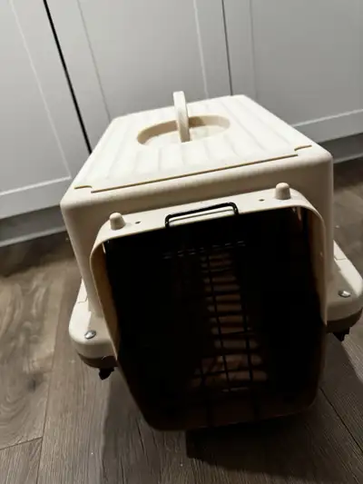 Two dog crates for sale, large one $50 and small one $25.