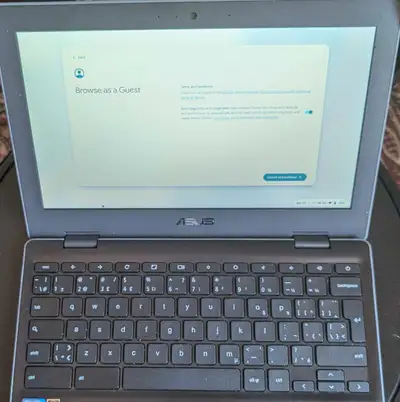 Asus Chromebook C204EE, rugged laptop, 11.6" HD display, 4GB RAM, 32GB eMMC storage. Sparingly used,...
