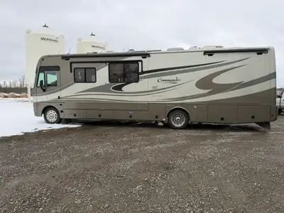 A spacious well layout motorhome, with the slides in you can still walk to the rear to access all am...
