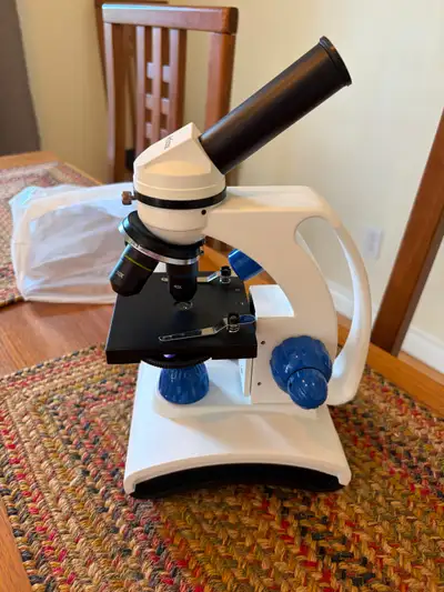 Student microscope with unprepared slides, prepared animal etc slides, different lenses, make your o...