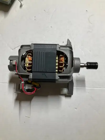 Motor for washing machine model WFW9750WR00, excellent condition just like new.