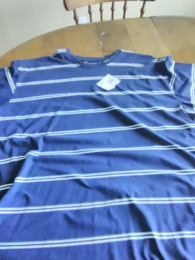 tee shirt never worn $5 email kentjcampbell@hotmail.com or call 902 436 0736 please leave a message