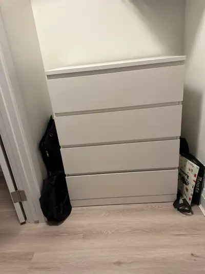 4 drawer dresser with minor scratch and chip (pictured). Dimensions: Width: 32 inches Depth: 19 inch...