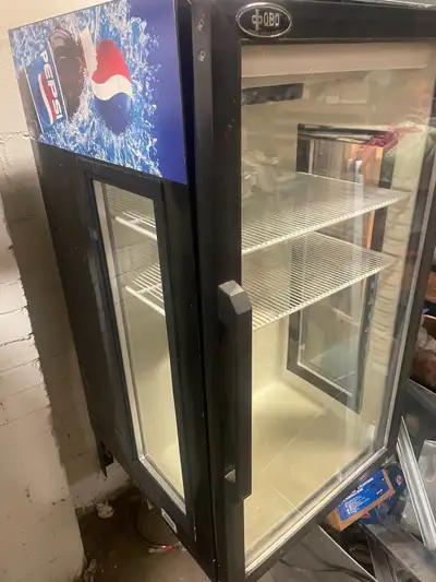 Commercial glass-door display refrigerator in good working condition. Perfect for drinks, snacks, ho...