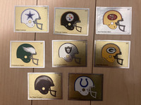 Eight 1988 Panini NFL football helmet stickers