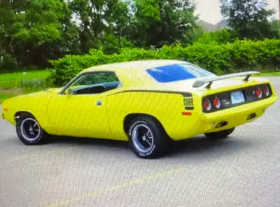 1974 Plymouth Barracuda Low Mileage 360 V8 4 speed Manuel with Hurst Pistol Grip Shifter Color: Lemo...