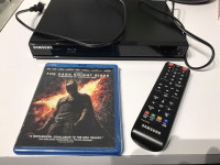 Samsung blu ray player with new disk and remote negotiable 