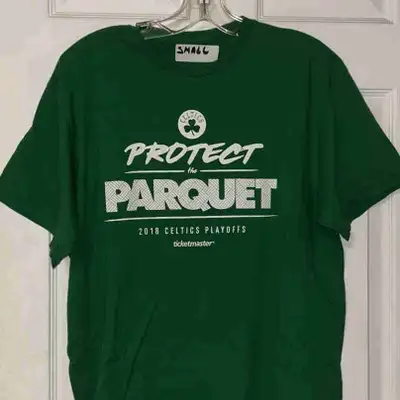 Celtics pride with this 2018 Playoffs 'Protect the Parquet' T-shirt available in two sizes! This spi...