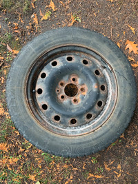 One (1) ) Winter Tire (Flat) on Rim
