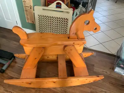 Selling a solid wooden rocking horse. Made from 2 x ? wood. This is very solid and sturdy, even for...
