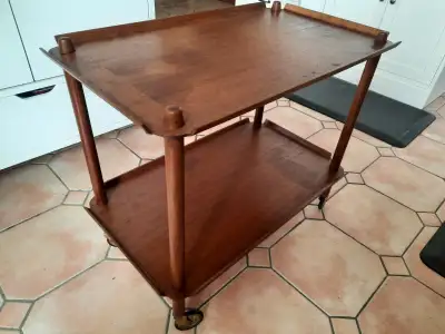 Beautiful vintage Danish mid-century modern teak bar cart or tea trolley with elegant and sleek mode...