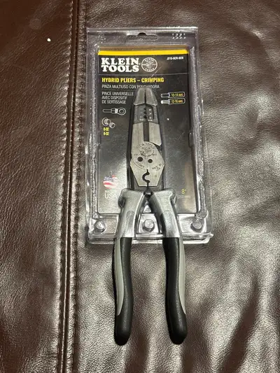 I'm offering a pair of Klein Tools Hybrid Pliers, model number J215-8CR SEN, designed for versatile...