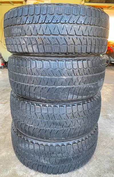 REDUCED PRICE For sale - set of four Bridgestone Blizzak winter tires only used for half a season wi...