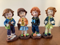 4 Child Figurines (2 Girls, 2 Boys)