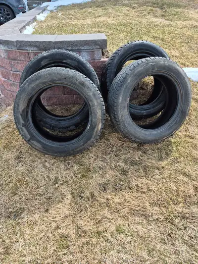 Four P225/60R17 winter tires. Approximately 50% thread remaining. No plugs or patches.