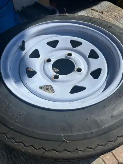 Selling a used tire and rim combo, size 4.80-12, ideal for trailers. It's in good condition and read...