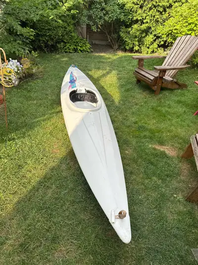 This kayak has some wear and tear from previous adventures, but it's still in good working condition...