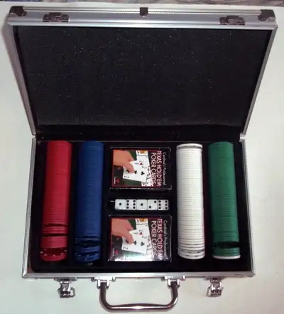 Includes: 200 poker chips: 50 red, 50 blue, 50 white, 50 green. One dealer button. 2 complete card d...