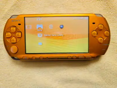 I have a sony psp 3000 in gold. It is in excellent condition and modded. It comes with charger, new...