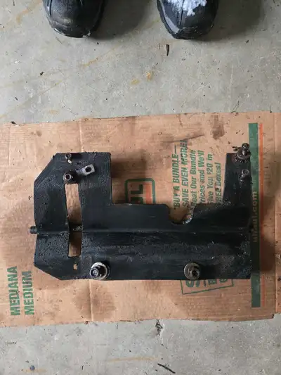 Plow including attachments removed from a 2000 Polaris Sportsman 335.