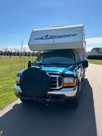 Ford F-250 Super Duty Truck with Slide-In Truck Camper for Sale
