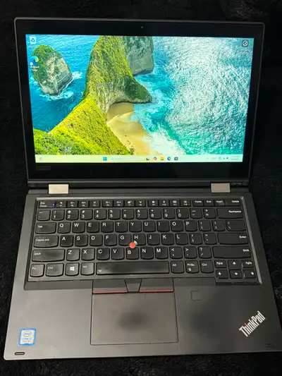 For sale is a Lenovo ThinkPad L390 Yoga 2-in-1 laptop, featuring a touchscreen and powered by an Int...