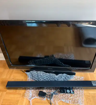 Selling a used Toshiba 40-inch LCD TV with soundbar, perfect for enhancing your home entertainment s...