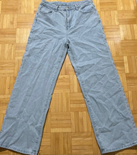 Light wash denim jeans with butterfly print at the back 