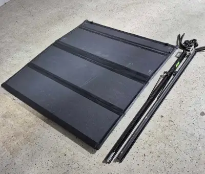 MX4 Bakflip tonneau cover Fits 09-24 Ram Classic with 5.7 box Good condition. Comes with all hardwar...