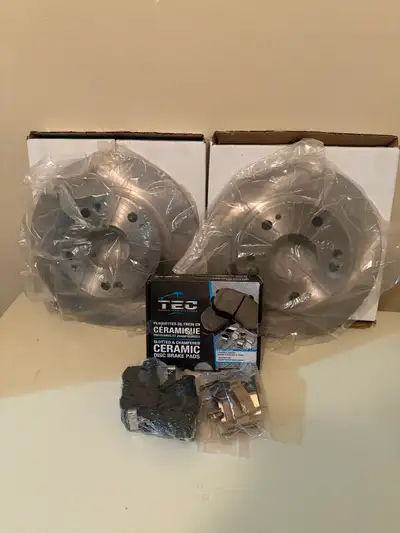 Brand new set of Rear Brake Pads and Rotors for a 2014 Honda Civic. Originally had bought these for...