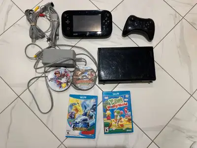 Wii U System, Game Pad, Controller, Cords and Games $240, View more