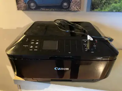 This is a great 3 in 1 printer, scanner and fax machine. It prints high quality photos and can print...