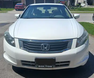 2009 Honda Accord EX-L, white with tan leather interior. One owner. Lady driven since new (a non-smo...