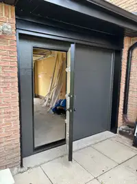Garage doors with walk through 