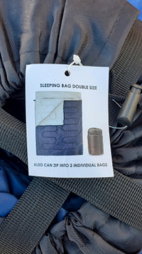  NEW SLEEPING BAG DOUBLE SIZE  -   can zip into 2 individual bag