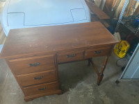 Gently used sold wood desk 