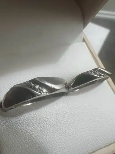 10 k men’s ring , 3 natural diamonds 295 dollars Size 9.5-10 10 k women’s ring ; 1 diamond Size 4.5...