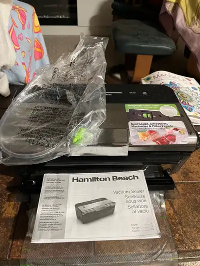 Like new, Hamilton Beach vacuum sealer for food. In excellent condition. Rarely used. Comes with all...