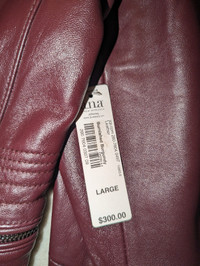 Brand New with tags: Beautiful lambskin leather jacket.