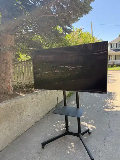  55 inch Samsung curved TV and stand, View more