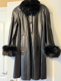 Woman's black Leather long coat.